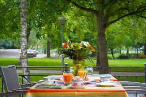 Κήπος έξω από το Hotel Parc Belair