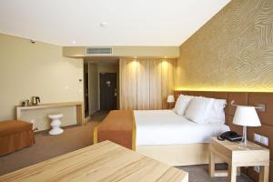 Area soggiorno di Golden Tulip Avignon Le Paradou