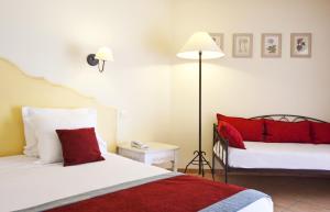 Letto o letti in una camera di Golden Tulip Avignon Le Paradou