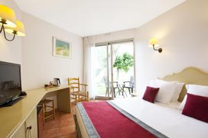 TV o dispositivi per l'intrattenimento presso Golden Tulip Avignon Le Paradou