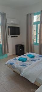 Galerija fotografija objekta GuestHouse COMFY - rooms with a shared kitchen and bathroom u gradu 'Haifa'