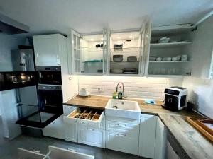 Kuchyň nebo kuchyňský kout v ubytování casa en Masnou junto a playa y tren
