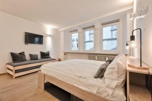 Ένα ή περισσότερα κρεβάτια σε δωμάτιο στο Lauben Flat Bolzano