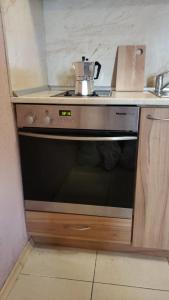 A kitchen or kitchenette at Villa Aspen Guest House