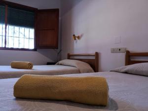Postel nebo postele na pokoji v ubytování Casa Rural La Colina