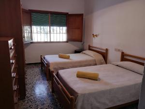 Postel nebo postele na pokoji v ubytování Casa Rural La Colina