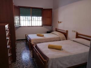Postel nebo postele na pokoji v ubytování Casa Rural La Colina