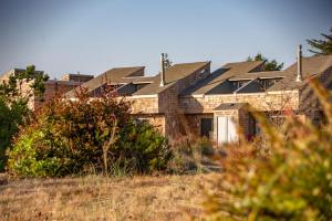 a brick house with a row of houses at Surfcrest Resort in Copalis Beach