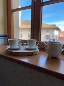 Příslušenství pro přípravu čaje a kávy v ubytování Residenza d'Epoca Albergo Grimani