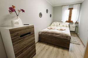 Posteľ alebo postele v izbe v ubytovaní Apartament KARO 1 Karkonosze