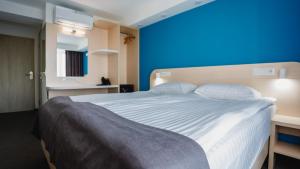 Postel nebo postele na pokoji v ubytování Park Hotel