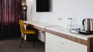 Příslušenství pro přípravu čaje a kávy v ubytování Park Hotel
