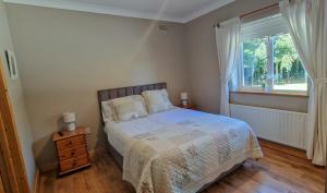 Postel nebo postele na pokoji v ubytování LittleField B&B Durrow, Laois