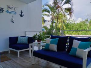 Posezení v ubytování Playa Juan Dolio, RD-Acceso Privado A La Playa Justo Al Frente En 1ra Línea, Áreas Sociales, BBQ, Piscina, Gazebos-Parqueo-Wifi-Netflix-Al Lado De Minimarket, Restaurantes, Bares, Tiendas, Clubes de Playa, Campos De Golf, Bancos Comerciales y más