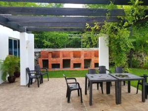 Zahrada ubytování Playa Juan Dolio, RD-Acceso Privado A La Playa Justo Al Frente En 1ra Línea, Áreas Sociales, BBQ, Piscina, Gazebos-Parqueo-Wifi-Netflix-Al Lado De Minimarket, Restaurantes, Bares, Tiendas, Clubes de Playa, Campos De Golf, Bancos Comerciales y más