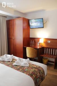 En eller flere senger på et rom på Hotel Qoya Palace - Machupicchu
