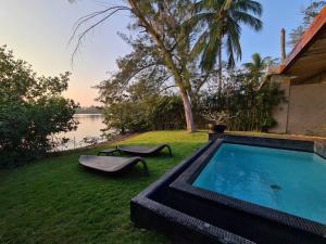 einen Pool im Hof eines Hauses in der Unterkunft Isla Tajín in Tuxpan de Rodríguez Cano