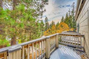 a balcony with a view of the woods at Lake Tahoe Retreat in Incline Village