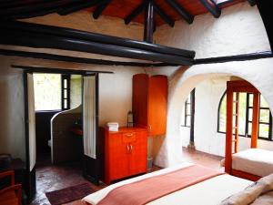 Postel nebo postele na pokoji v ubytování Sierra Alisos Hotel de Campo