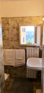 A bathroom at Soggiorno Dimora Del Grifo