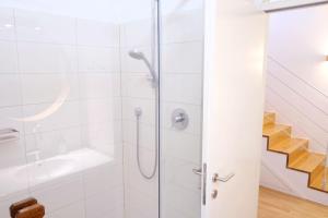 Ванная комната в Apartment Lauben - Alpstay +27 фотографий