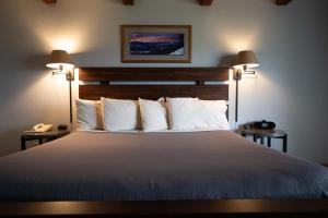 En eller flere senge i et værelse på Hotel Vienna