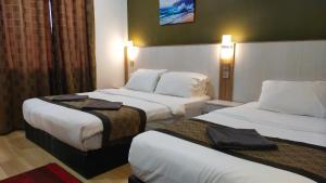 Krevet ili kreveti u jedinici u okviru objekta The Nutshell Chalet Langkawi