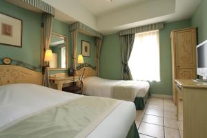 Postel nebo postele na pokoji v ubytování Hotel Monterey Lasoeur Ginza
