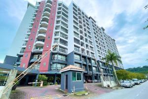a large apartment building with a building at Luï Luï Comfy Condo in Great Location in Kuah