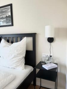 Postel nebo postele na pokoji v ubytování Apartment LoC Friedrichshafen