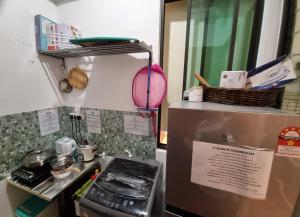 Kuchyň nebo kuchyňský kout v ubytování Sunway Paradise Home Staycation PH2120 SELF CHECK IN OUT