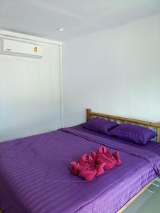 Postel nebo postele na pokoji v ubytování Koh Mook Sea View Bungalow
