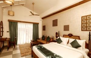 Hotel Sonar Bangla Mayapur客房内的一张或多张床位