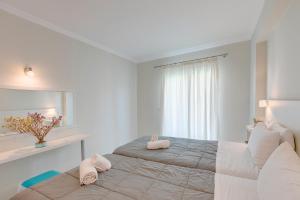 Letto o letti in una camera di Club Zante Plaza