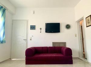 A television and/or entertainment centre at House Marina