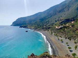 an aerial view of a beach on a mountain at House Marina in Paránimfoi