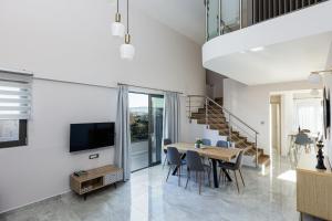 A television and/or entertainment centre at Aurora apartments