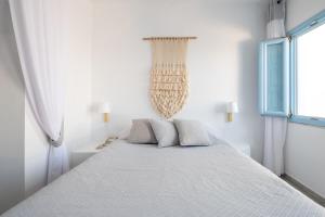 Letto o letti in una camera di Andromeda Villas & Spa Resort