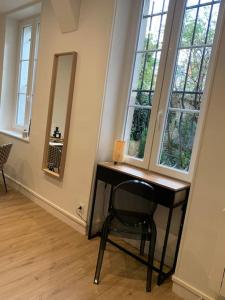 Φωτογραφία από το άλμπουμ του Appartement chaleureux στη Ντιζόν