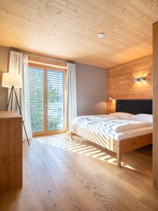 Postel nebo postele na pokoji v ubytování Atelier Ronacher