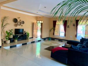Φωτογραφία από το άλμπουμ του Bungalow x Garten & Terrasse x WLAN x europäisch σε Moshi +24 φωτογραφίες