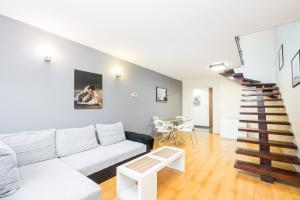 Posedenie v ubytovaní Radziwillowska Old Town Deluxe Apartment WAWELOFTS