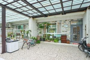 a building with bikes parked in front of it at 像個家plus民宿 AT home plus B&B in Hualien City