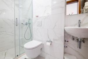 Koupelna v ubytování Hotel Nova