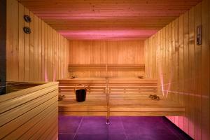 an empty sauna with a trash can in it at Hotel Ambasador in Split