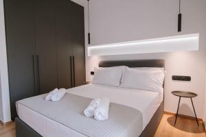 Posteľ alebo postele v izbe v ubytovaní Elegant Residence