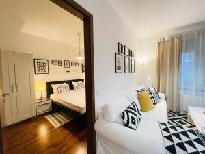 Posteľ alebo postele v izbe v ubytovaní Peony Székely Mihály Apartment - Free Garage