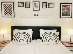 Posteľ alebo postele v izbe v ubytovaní Peony Székely Mihály Apartment - Free Garage