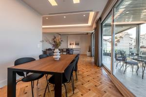 Posezení v ubytování Phaedrus Living City Center Luxury Flat Neos Kosmos + 7 fotografií