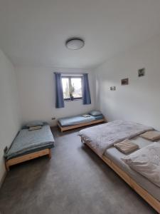 Postel nebo postele na pokoji v ubytování Casa Guzinni